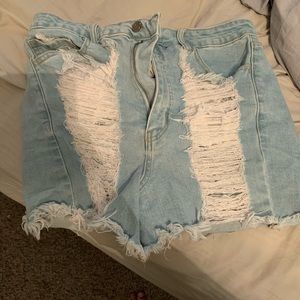 High waist ripped jean shorts. True denim with a little stretch!